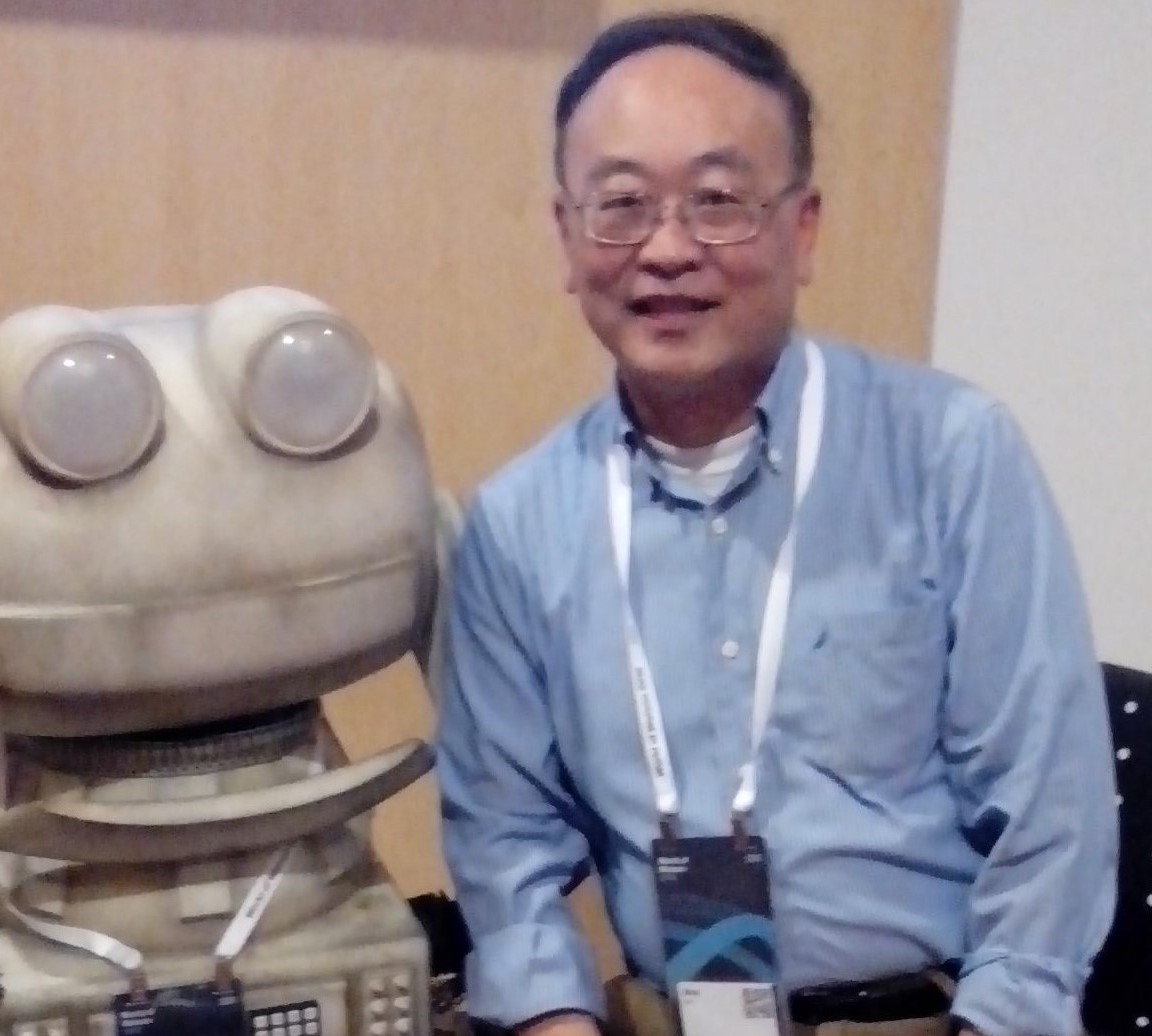 Alex with Robot in 2016 IBM